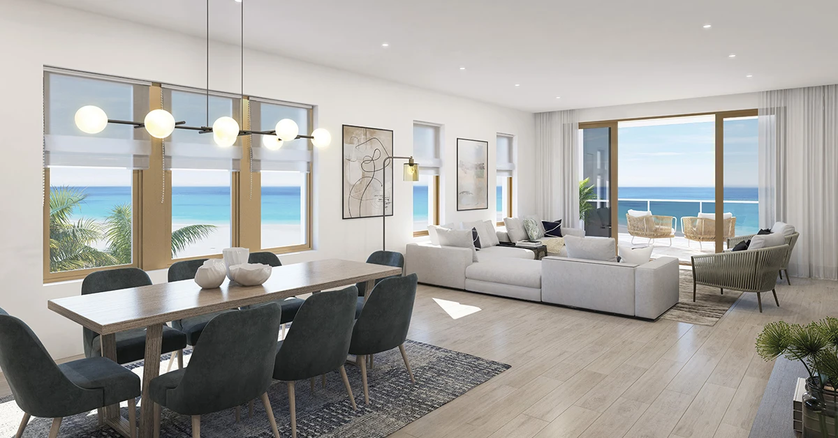 Open living and dining room with ocean-view balcony